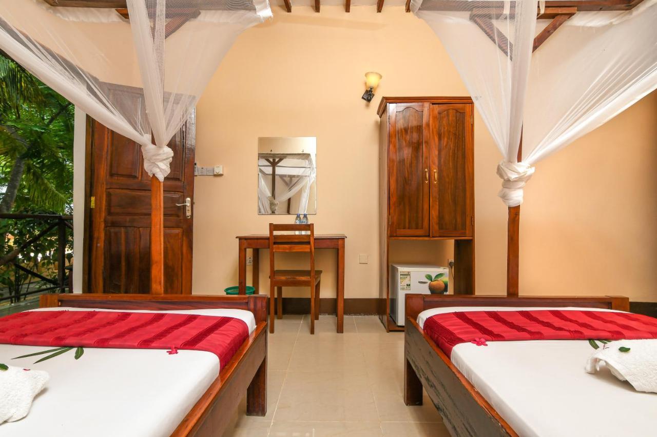 Amaan Beach Bungalows Нунгви Экстерьер фото