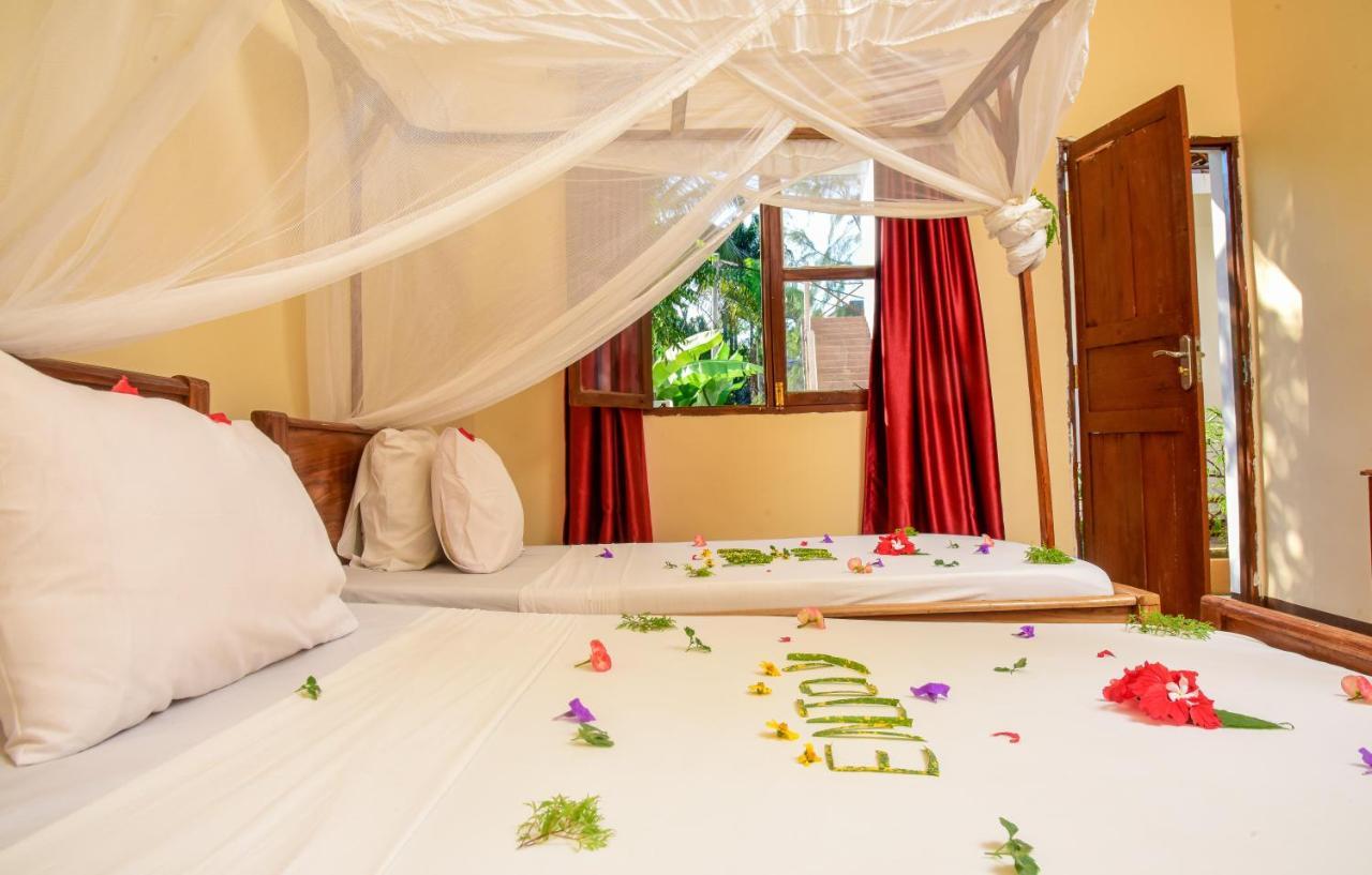 Amaan Beach Bungalows Нунгви Экстерьер фото