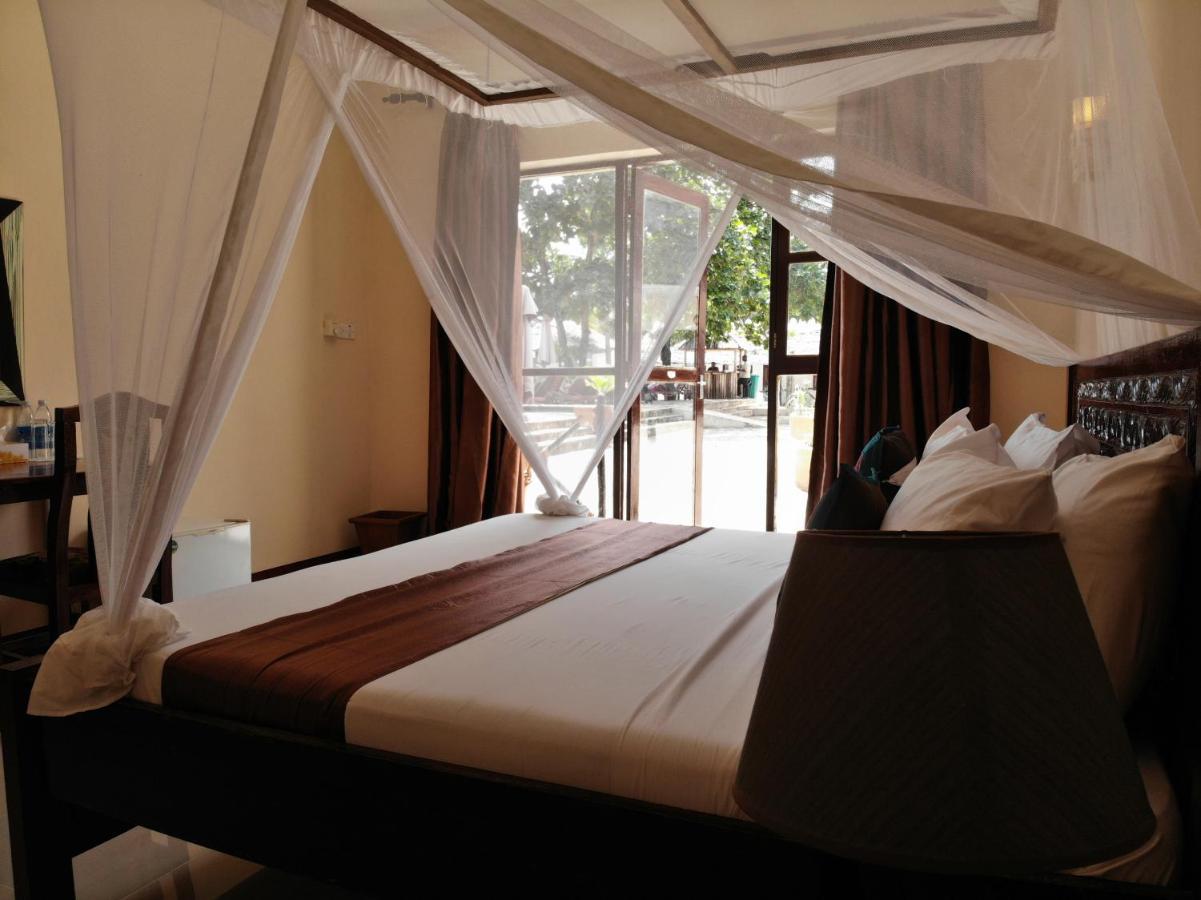 Amaan Beach Bungalows Нунгви Экстерьер фото